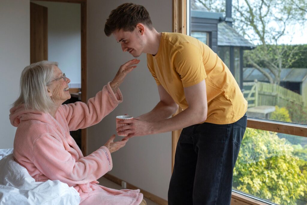 Giving His Grandmother a Cup of Tea
